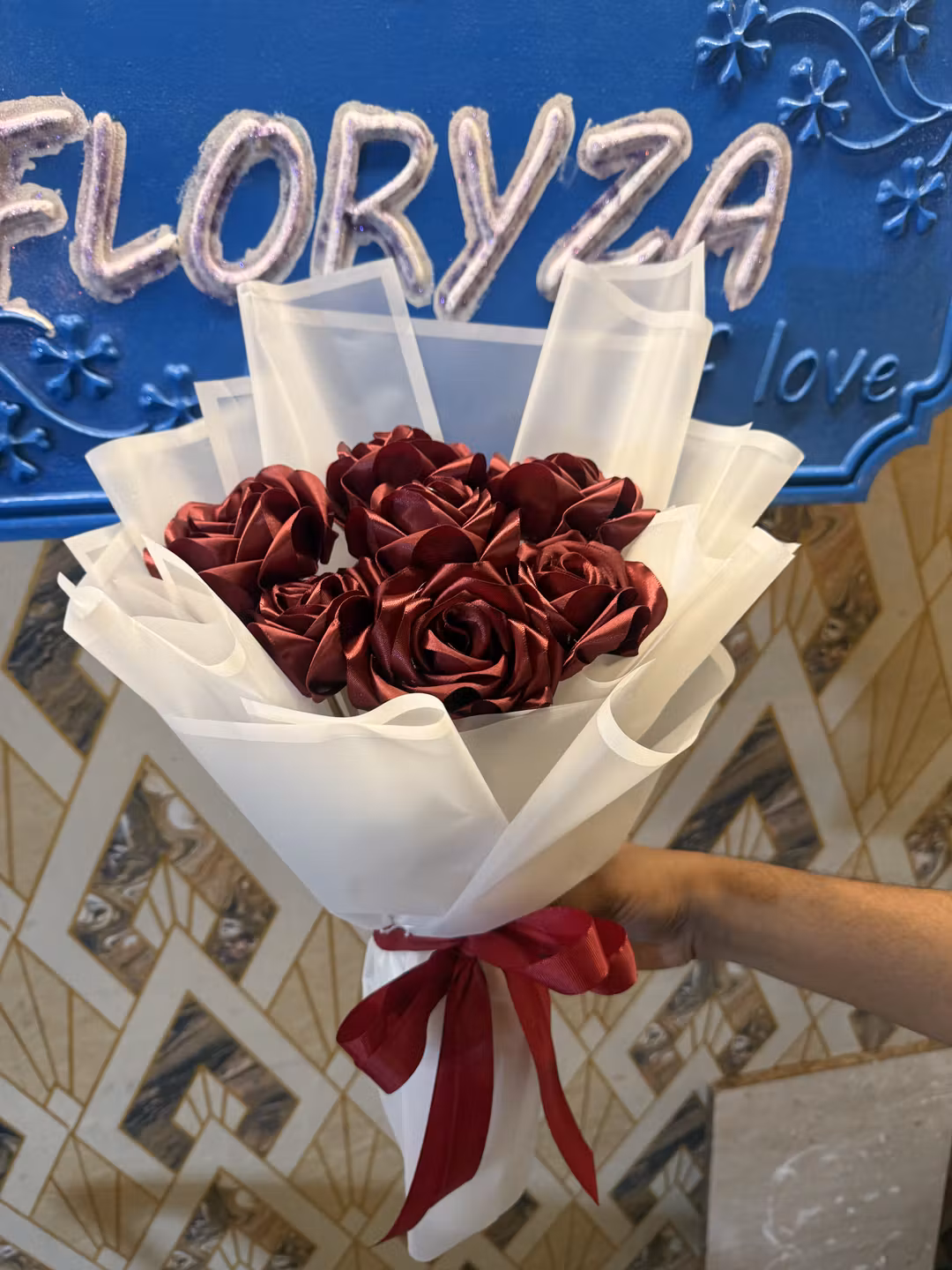 signature red flower arrangement